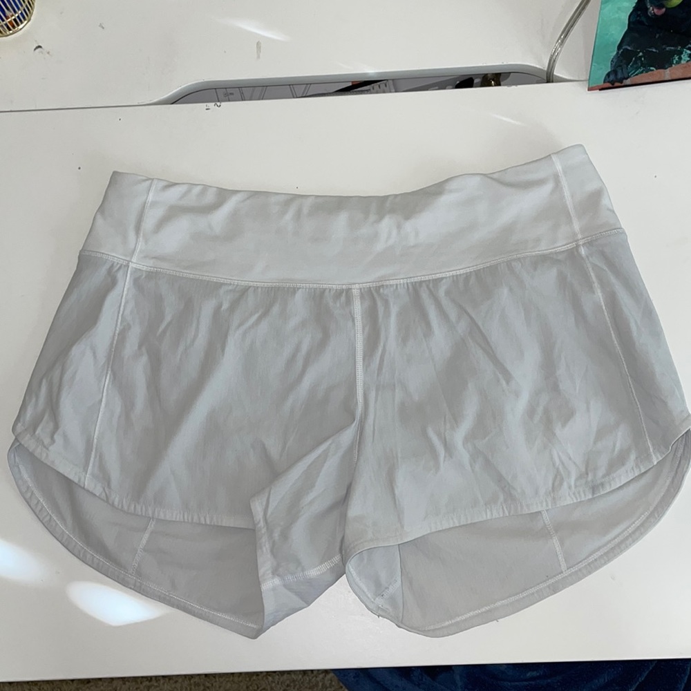 Lululemon white mid-rise lined shorts, size 10, 4” inseam
